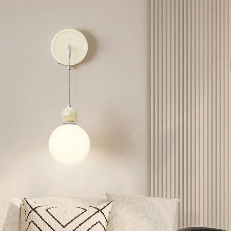 Coffee Model C hanging globe above a bedside cabinet