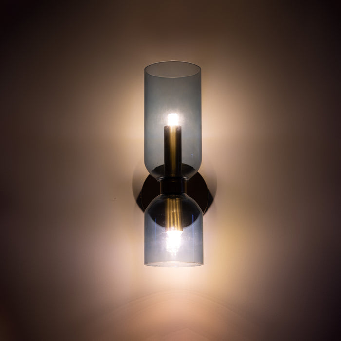 Lit Gray glass shades against a dark background