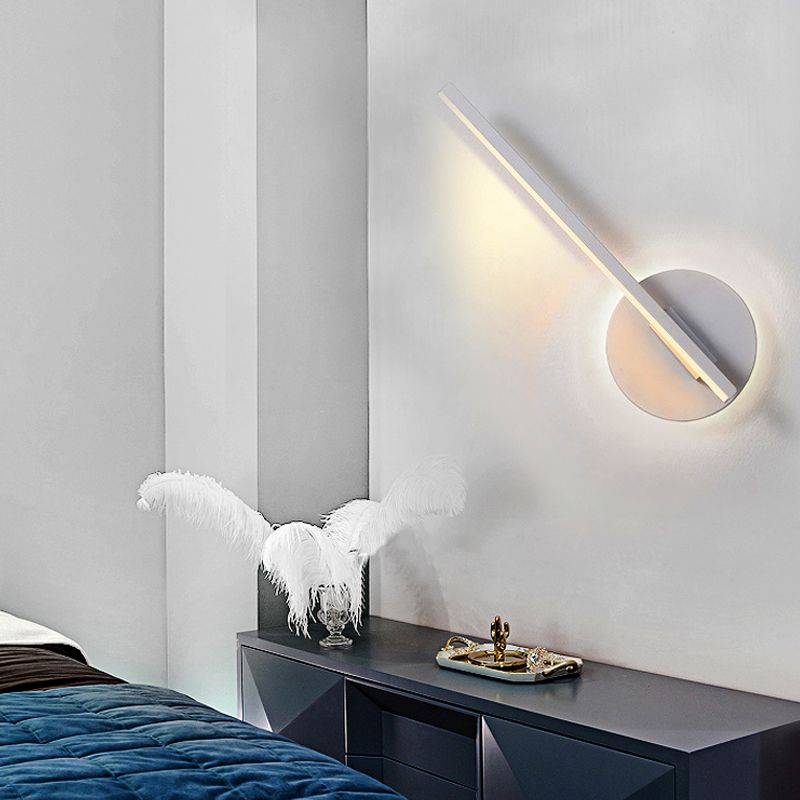 White diagonal Edge wall light above a console