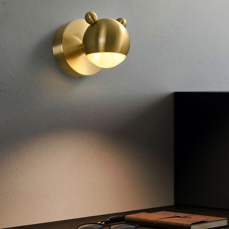 Leigh single gold-coloured bear light above interior furniture