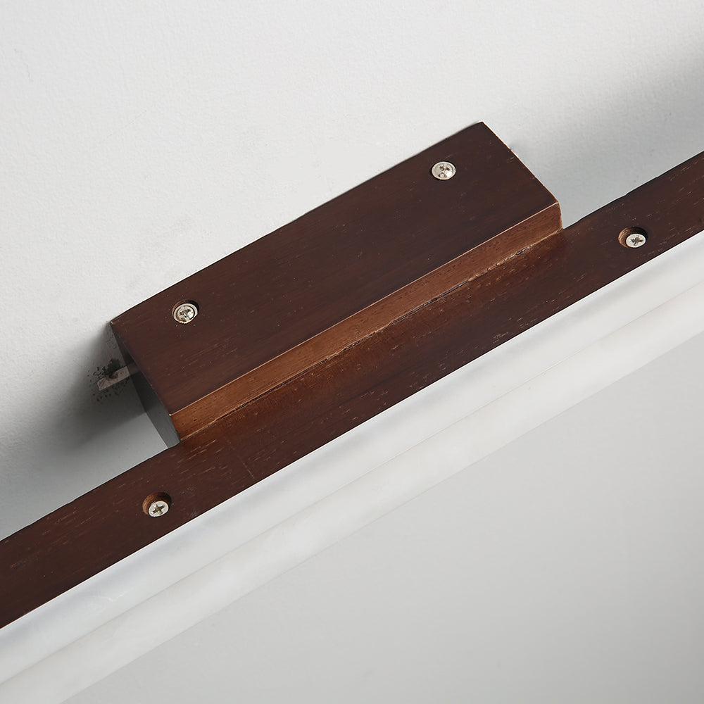 Rear detail of wooden mounting block and metal fasteners