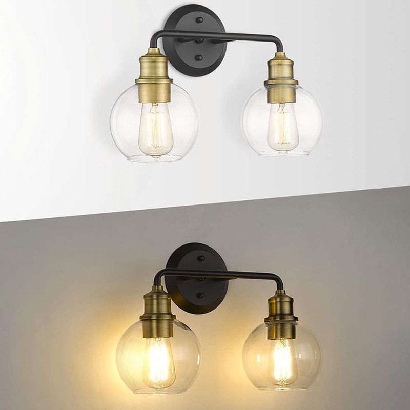Alessio two-light fixture shown unlit and with a warm photographed glow