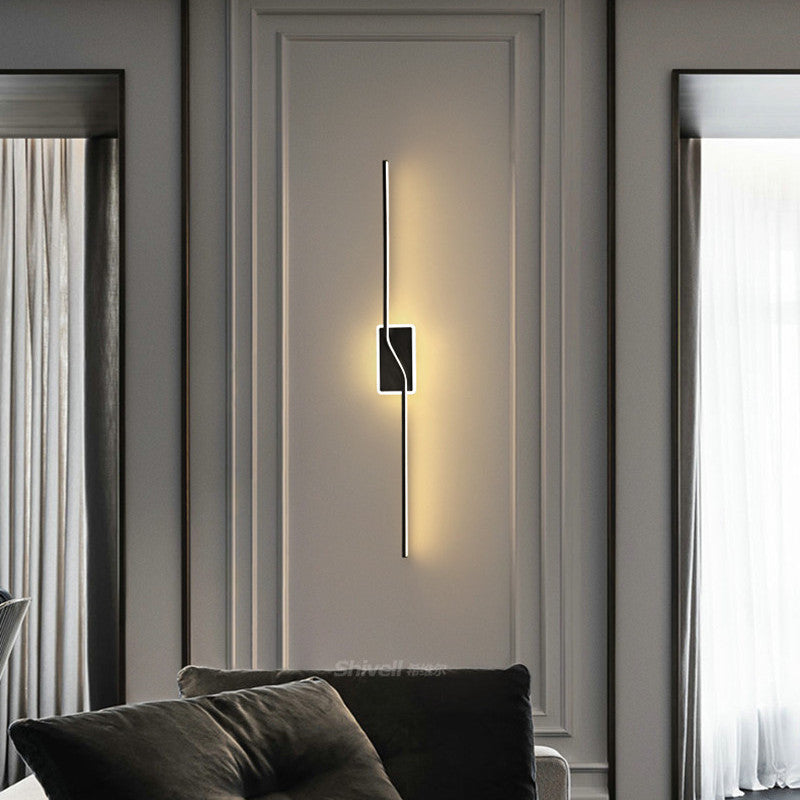Black Nordic wall light with a vertical offset bar