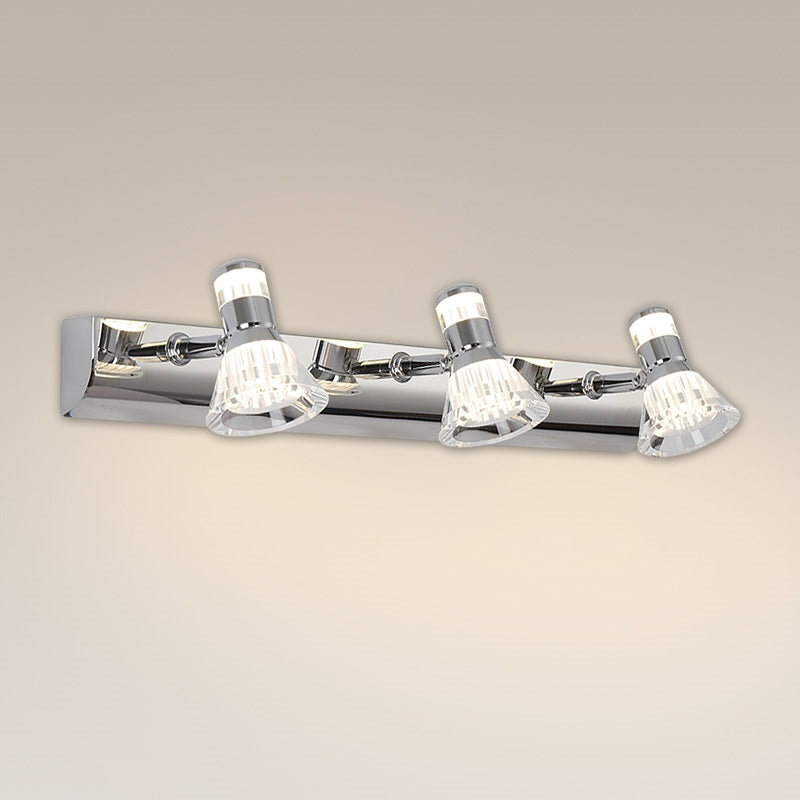 Angled view of Kristy three-head silver wall light with obliquely positioned conical heads