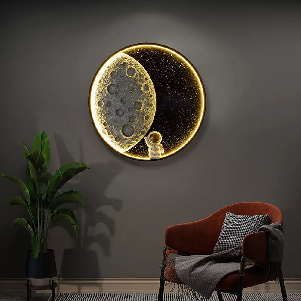 Warm glowing moon and astronaut light beside a chair