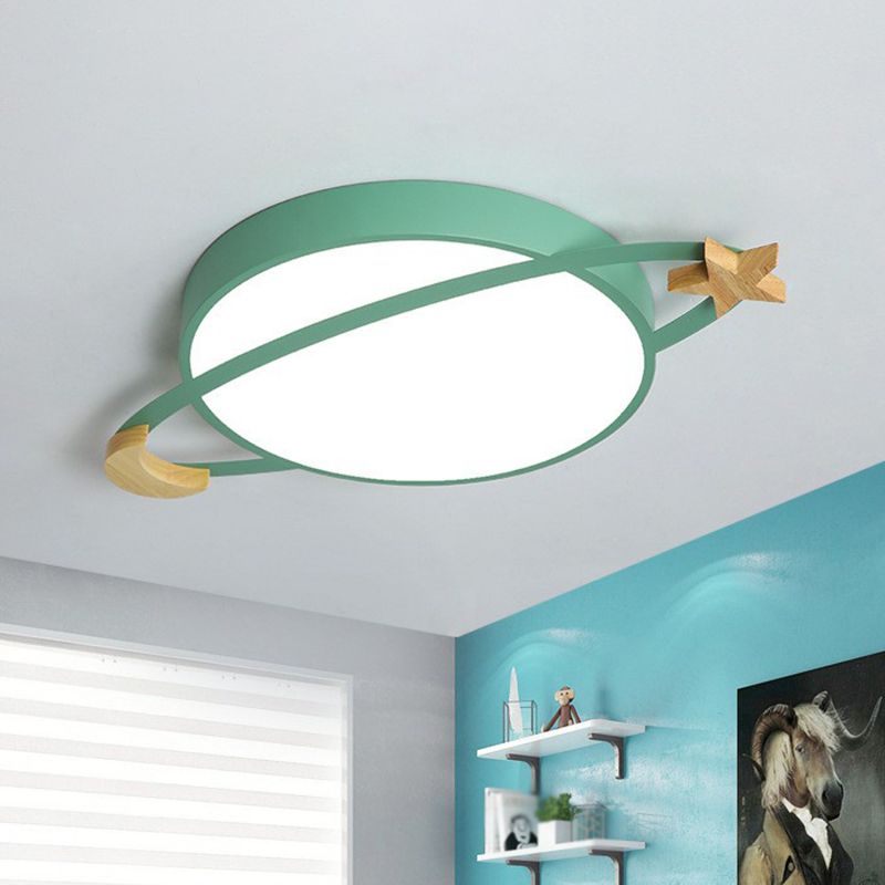 Green Morandi planet-style light mounted on a room ceiling.