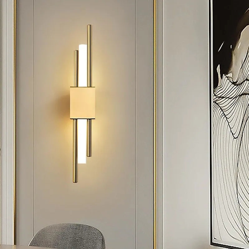 Gold-tone Alana vertical wall light with a matching central block