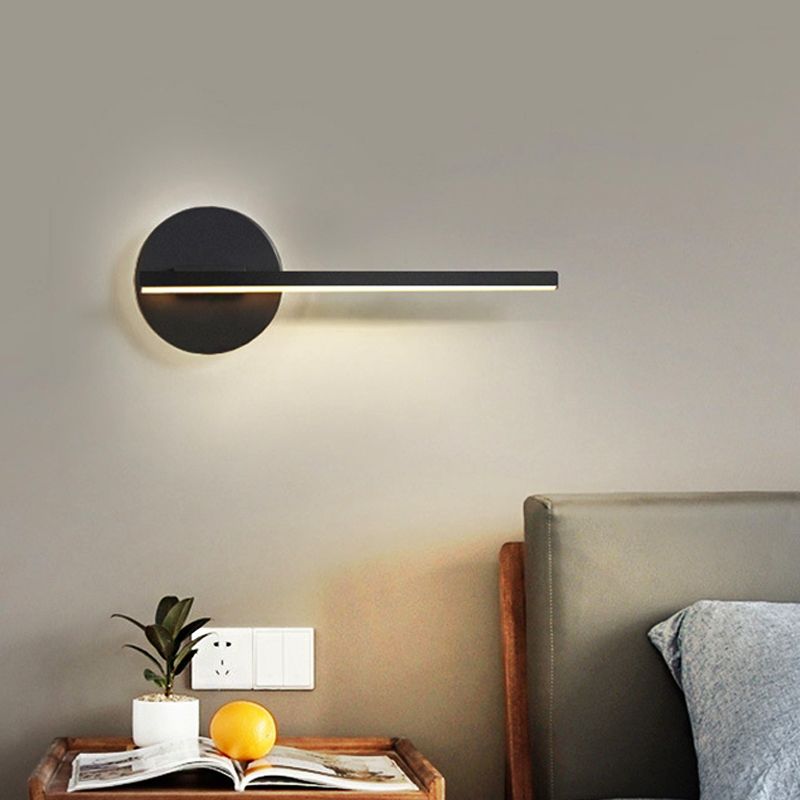 Black horizontal Edge wall bar beside a bed and side table