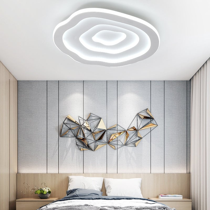 White-light Quinn Ripple selection pictured above a bed