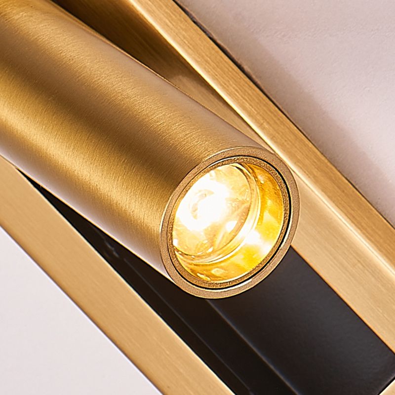 Close-up of Orr cylindrical gold-colour head and round light lens