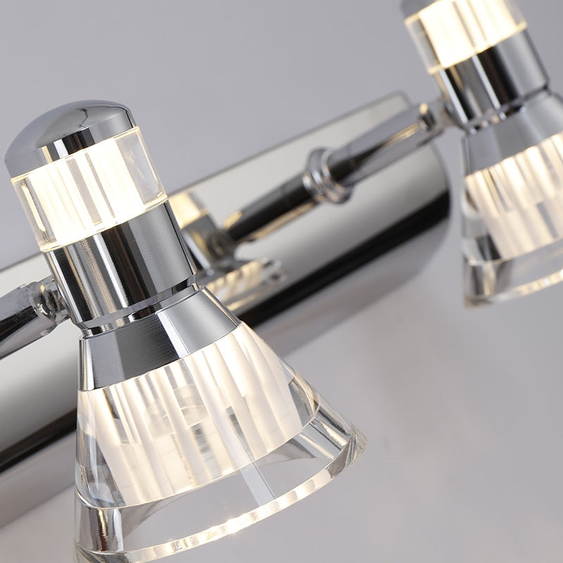 Close-up of Kristy clear flared cone heads and upper bands with reflective silver fittings