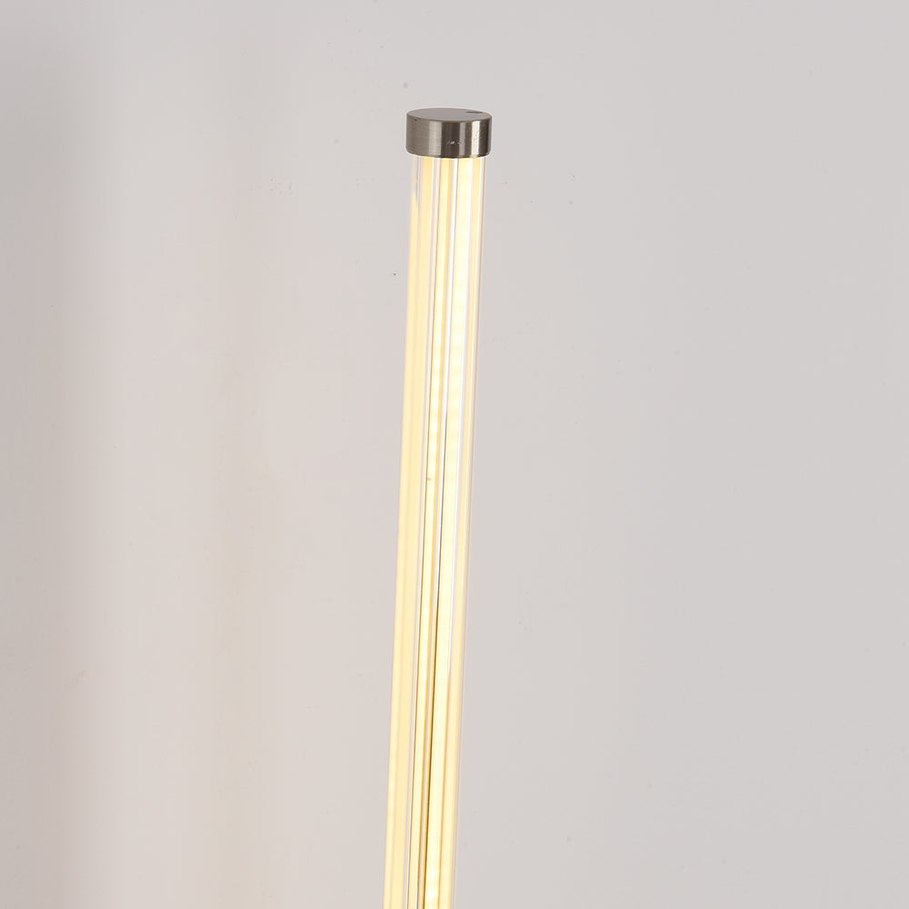 Close-up of Edge glowing clear rod with longitudinal lines and a silver-tone upper cap