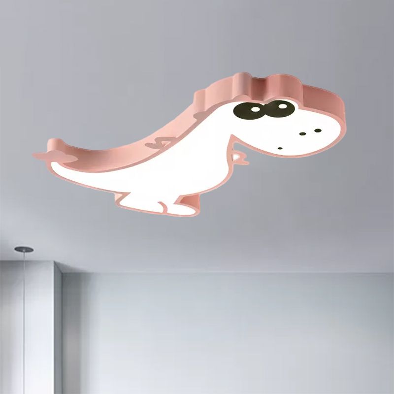 Pink Freja dinosaur ceiling light shown illuminated against a pale ceiling.
