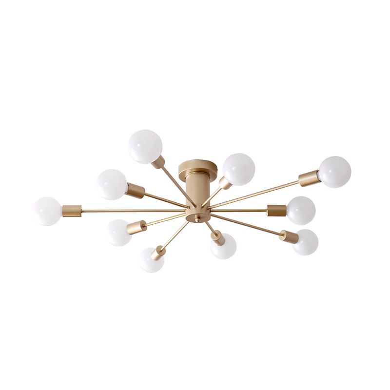 Isolated unlit gold ten-light Sputnik fixture with straight radial arms, round canopy and exposed white bulbs