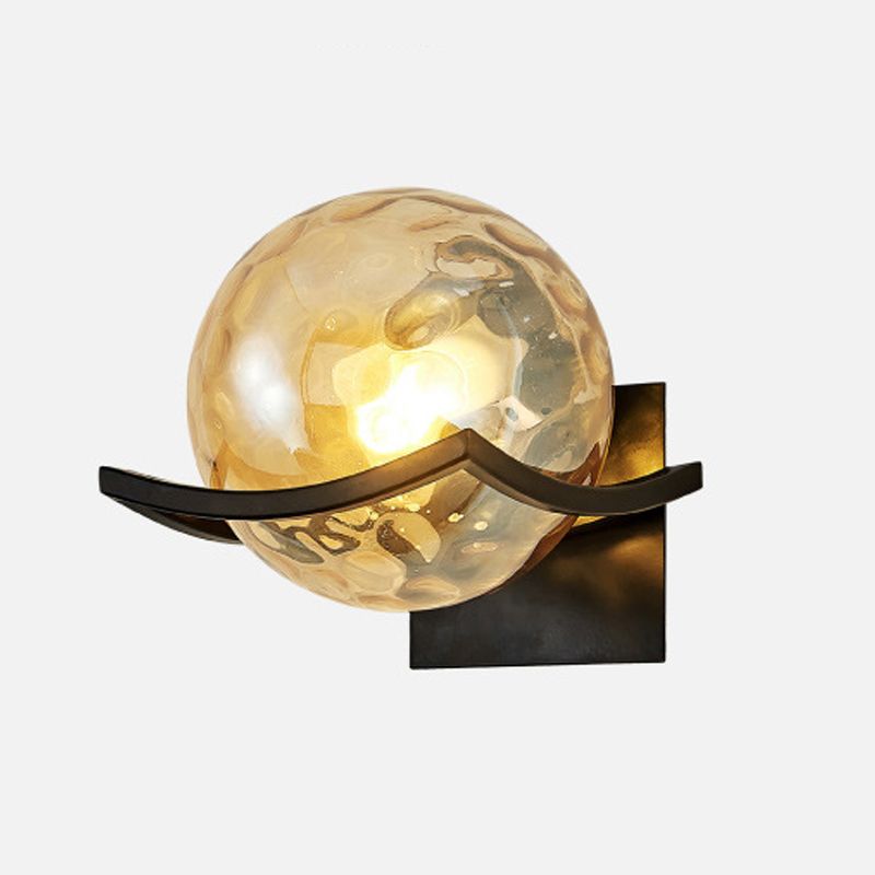 Valentina amber textured-glass globe on a curved black bracket