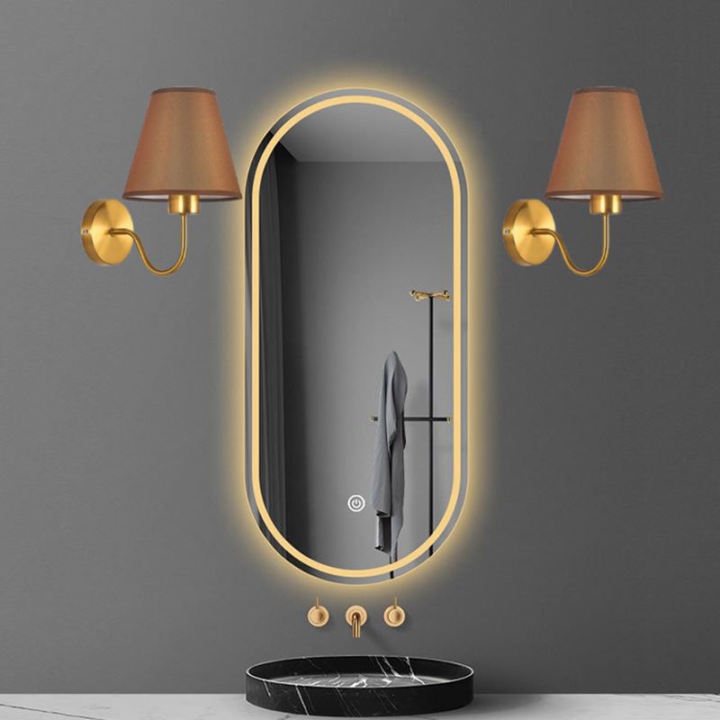 Two Eryn Coffee shade fixtures beside a mirror