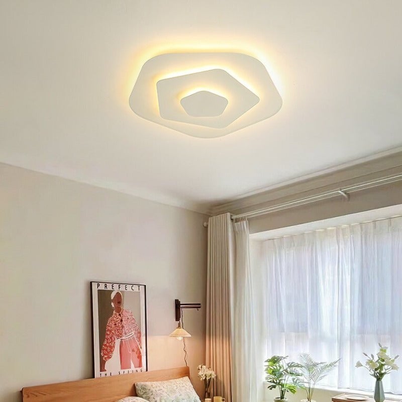 Quinn Style A rounded polygonal ceiling light with warm illumination