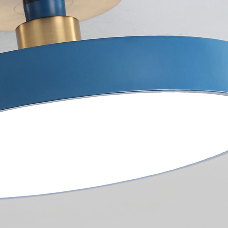 Close blue circular rim, white diffuser and gold-tone ceiling neck and plate