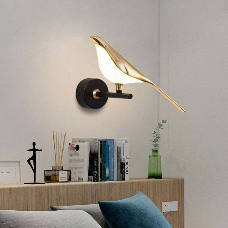 Single Clifford bird lamp above books and decor