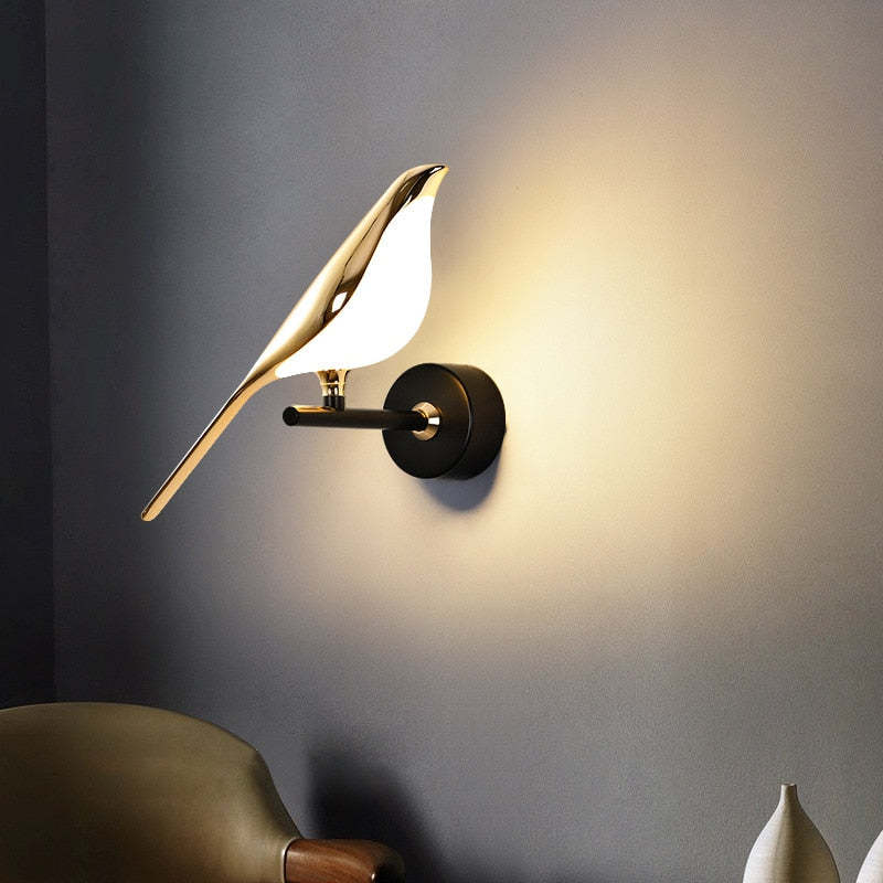Single glowing bird on a short Black wall arm