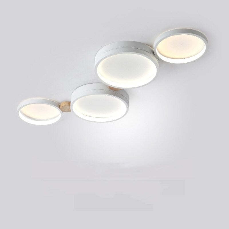 White four-head Sienna ceiling light with two larger and two smaller round light panels