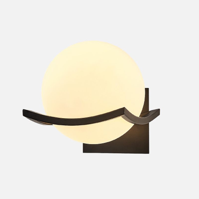 Valentina opaque white globe shown with a warm photographed glow