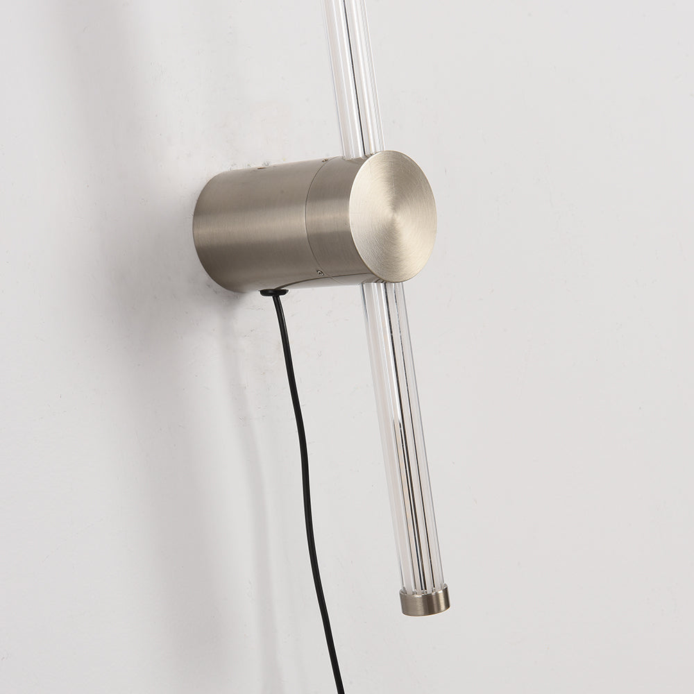 Detail of Edge silver-tone cylindrical base, clear rod, side fastener, lower cap and black cord
