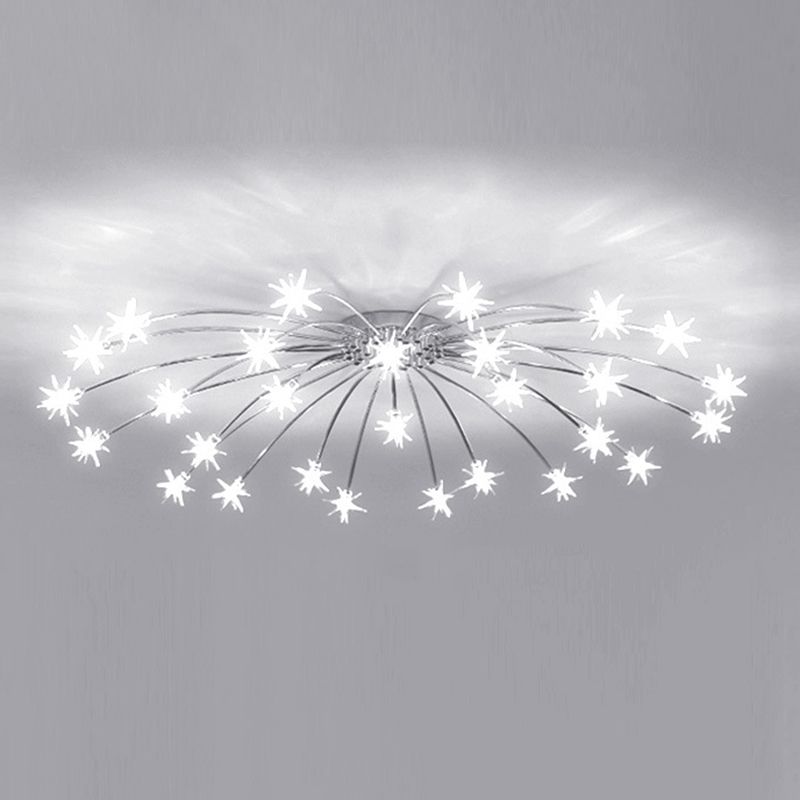 Monochrome wide starburst ceiling fixture with many lit glass stars, dense radial arms and round centre canopy