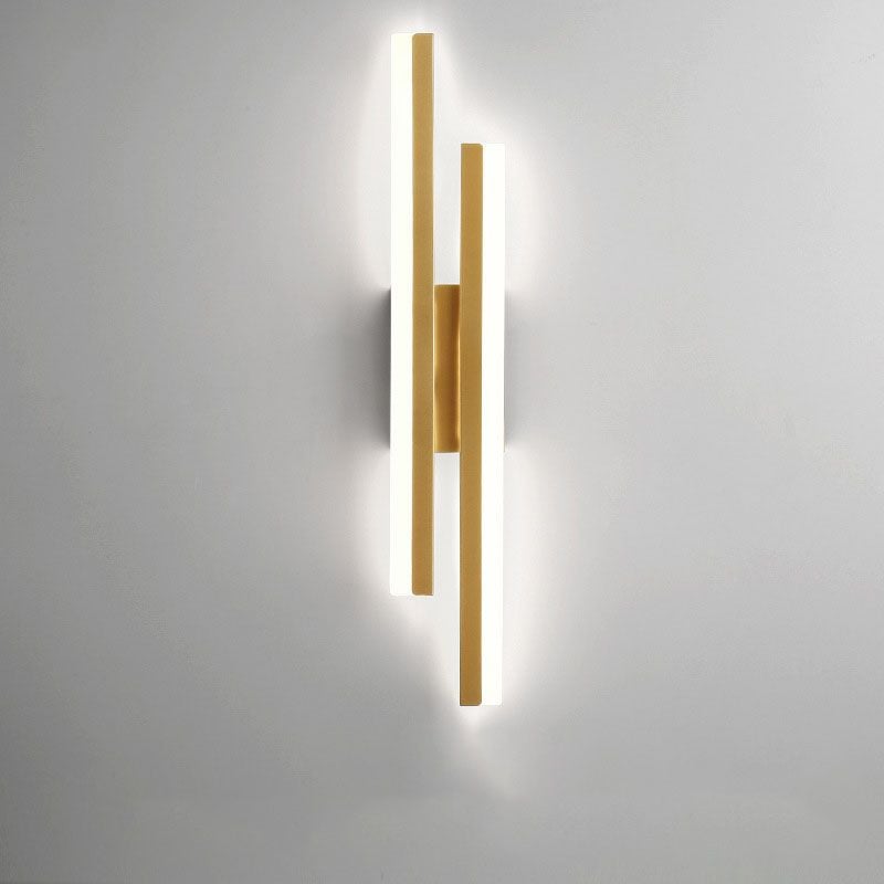 Gold Left-layout wall light with two offset bars, pale light faces and a central connector