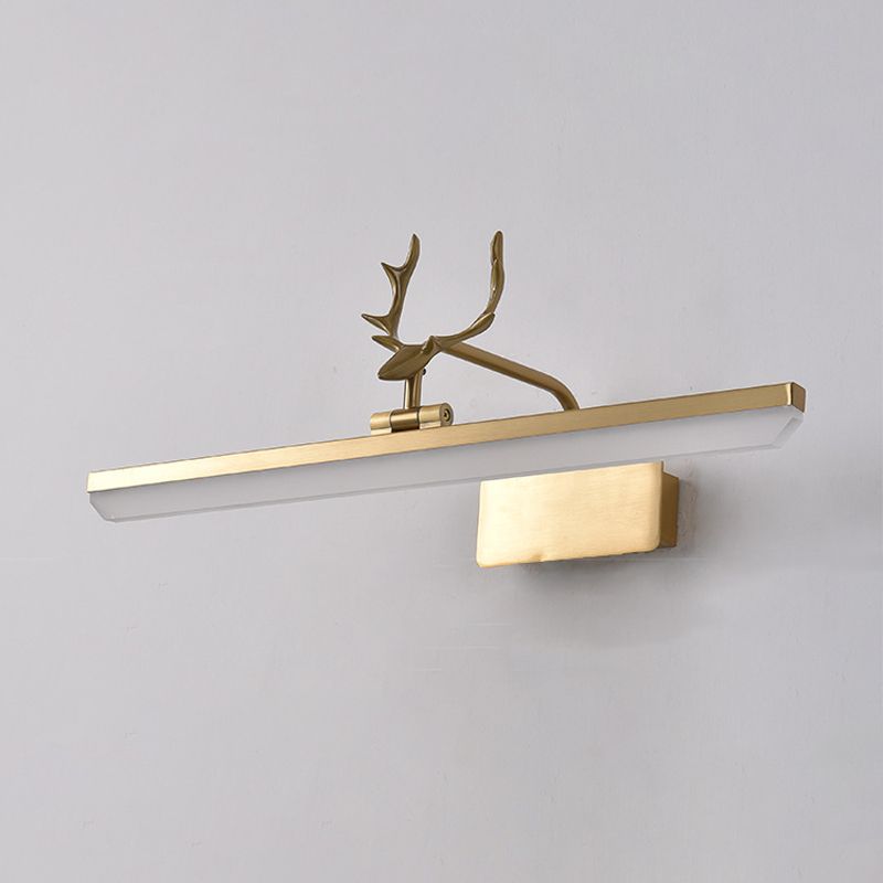 Unlit gold-tone antler wall light seen at an angle, with a pale straight diffuser and rectangular mounting plate
