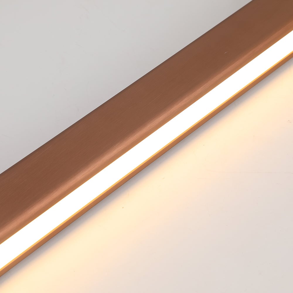 Tight detail of Brown Edge brushed metal bar and glowing white acrylic underside