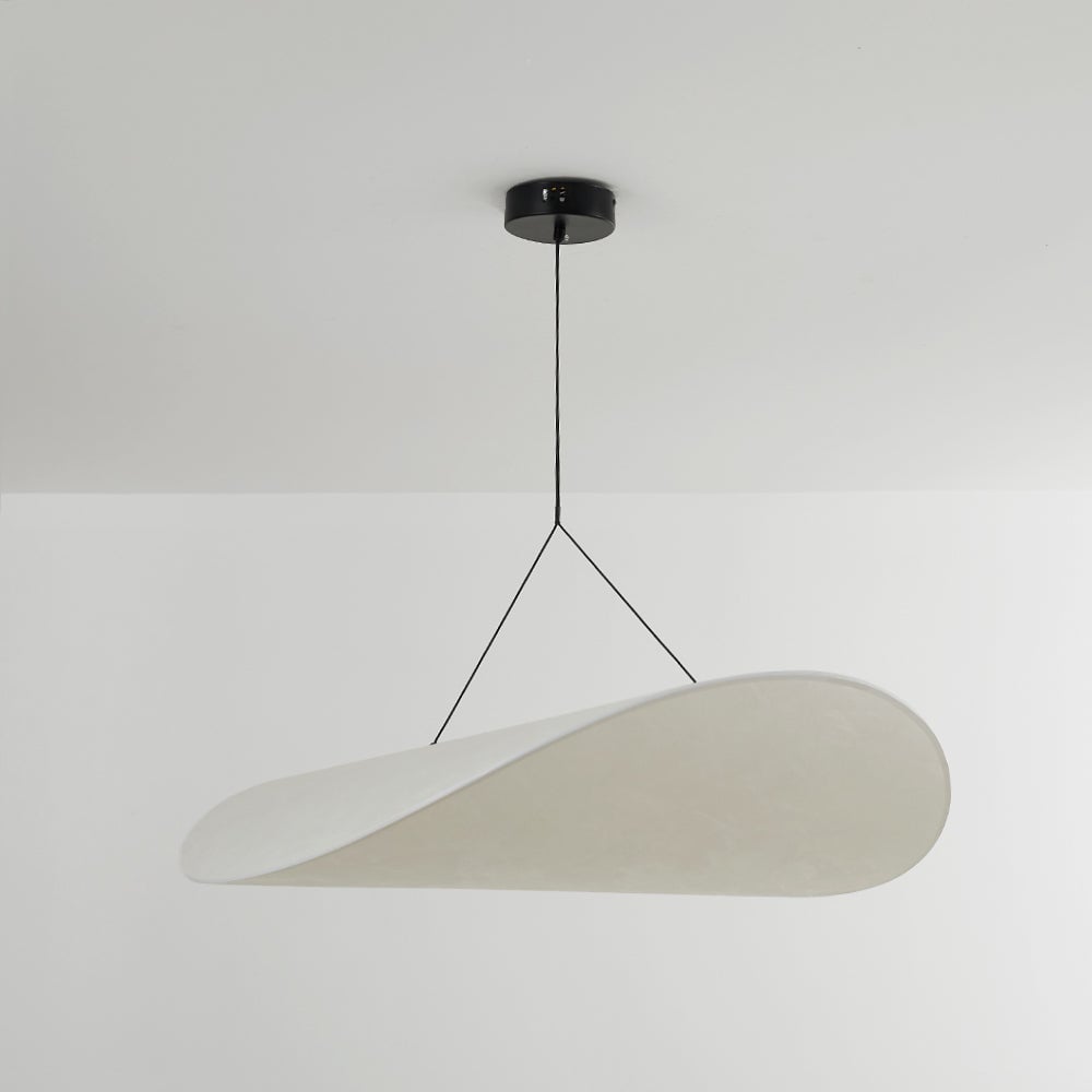 Unlit curved white fabric shade hanging below a round black canopy on a pale ceiling
