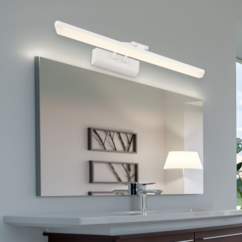 White Leigh light above a mirror cabinet and rounded basin, with another lamp reflected in the mirror