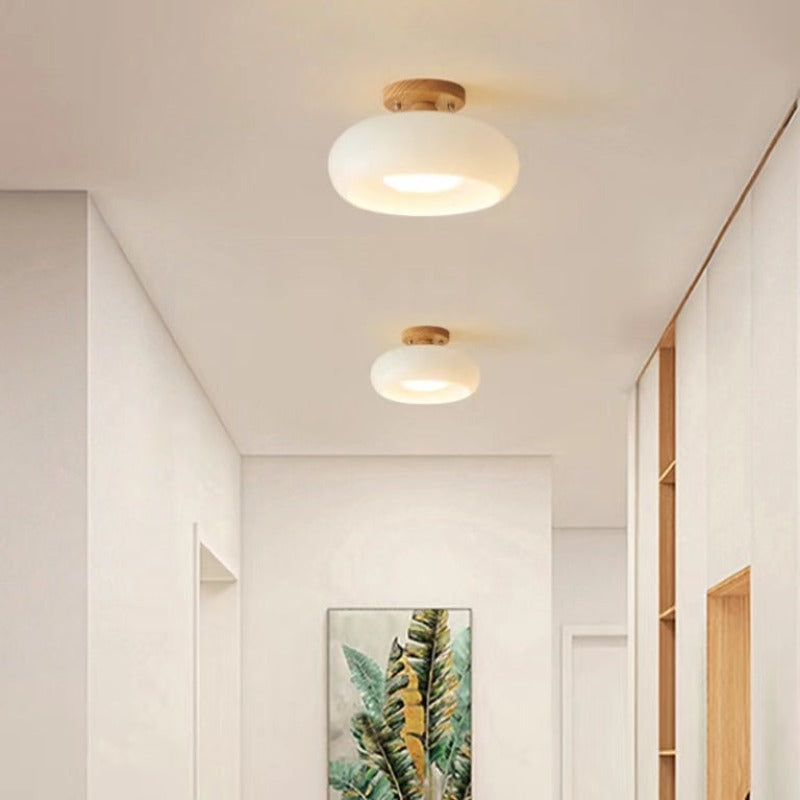 White Hailie ceiling lights in a bright corridor