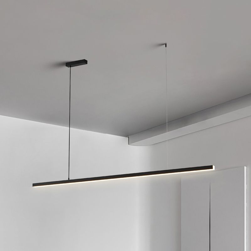 Angled view of black Edge bar with luminous underside and end, rectangular ceiling canopy and opposite anchor