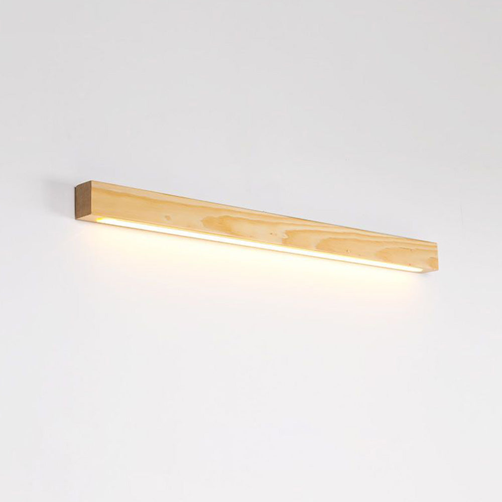 Alternate angled pale Wood Ozawa bar on a pale wall with light glowing below
