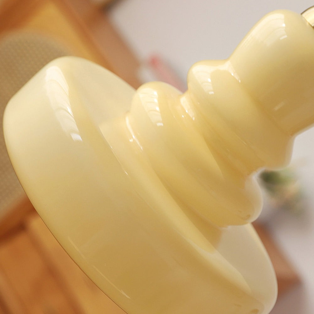 Close-up of glossy beige glass layers viewed from the side