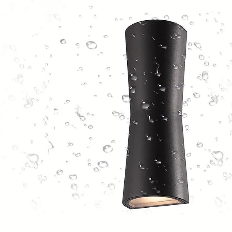 Black Orr torch wall lamp pictured against a water-droplet background.