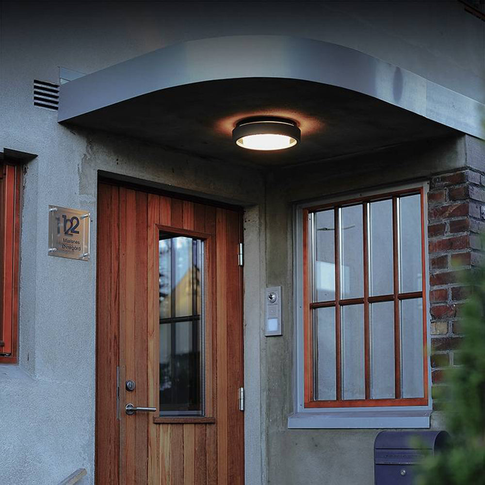 Orr Modern Circular Disc Shape Metal Outdoor Wall Lamp, Black - Cueteks