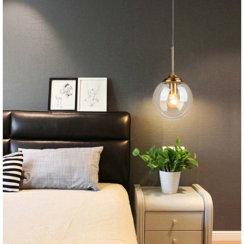 Valentina globe pendant light with gold-tone fittings