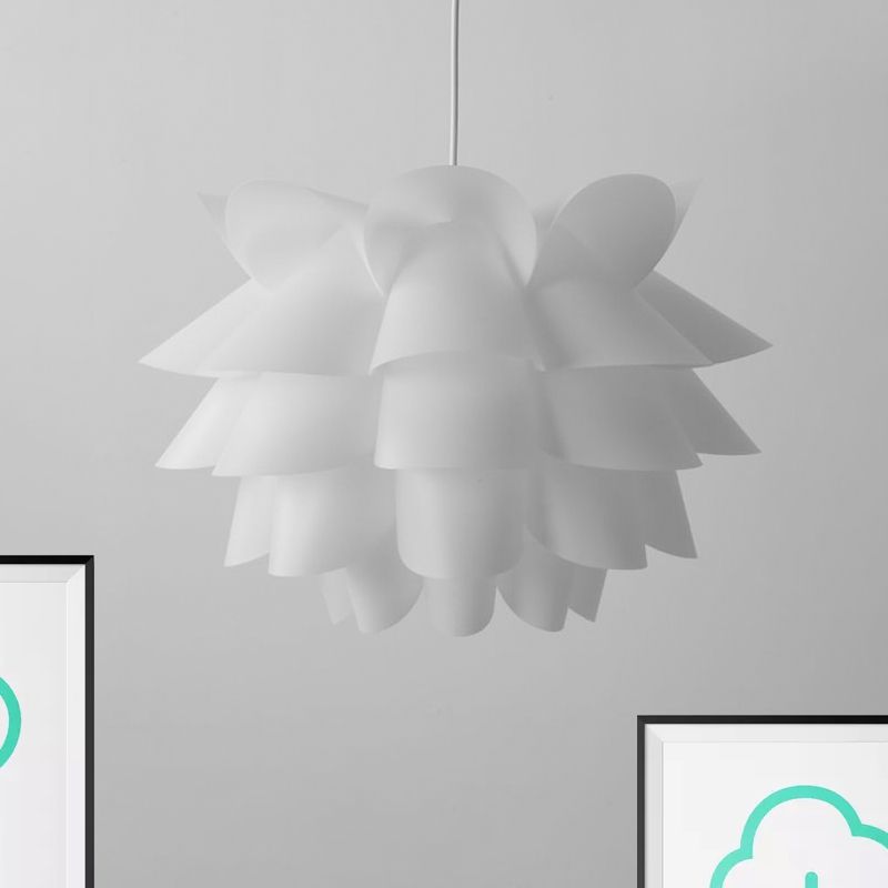 Unlit white Cairns pendant showing its layered flower form.