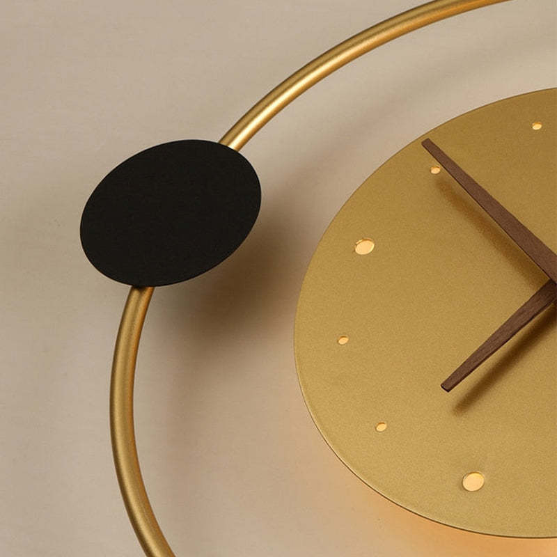 Detail of the gold clock dial and contrasting black disc