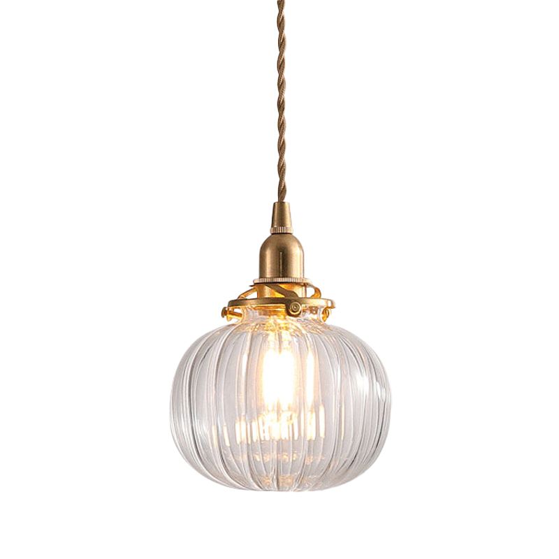 Clear ribbed globe pendant with twisted hanging cord