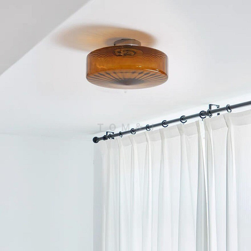 Hailie ceiling fixture near a window and curtain rail