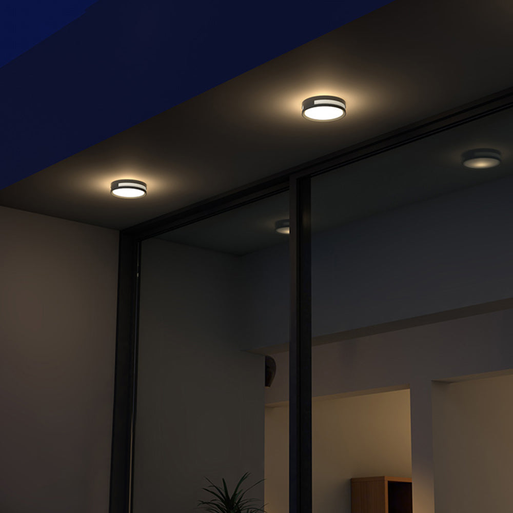 Orr Modern Round Metal/Acrylic Outdoor Waterproof Wall Lamp, Black - Cueteks