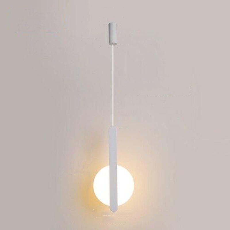 Long white vertical bar overlapping one luminous disc beneath a cylindrical white ceiling canopy