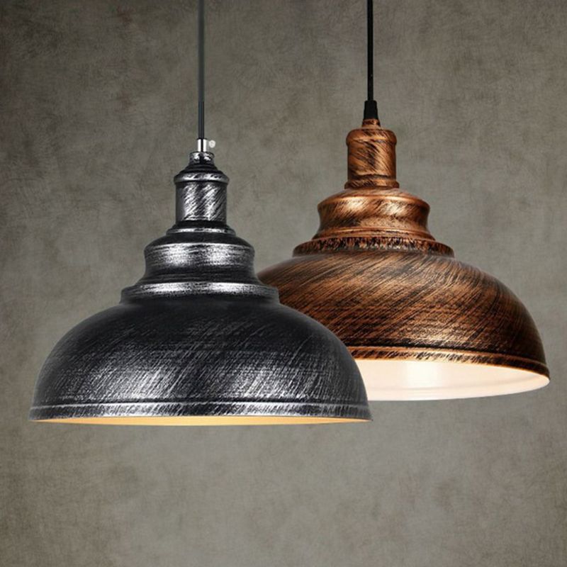 Silver-gray and copper-colour metal domes in close view