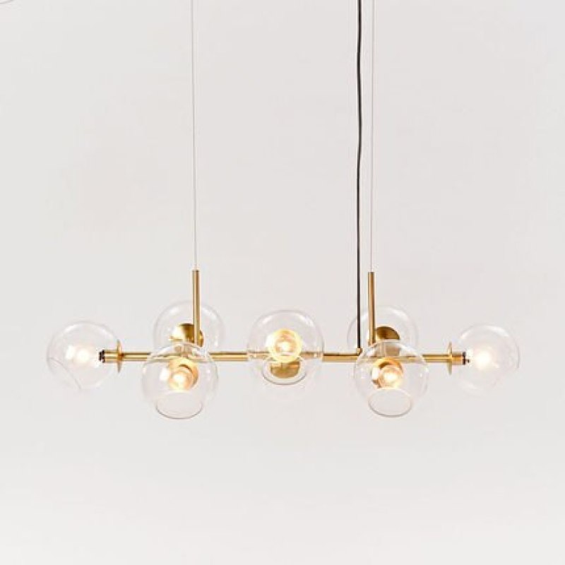 Gold-tone Valentina clear-globe pendant with lit bulbs, long suspension lines and a dark cable