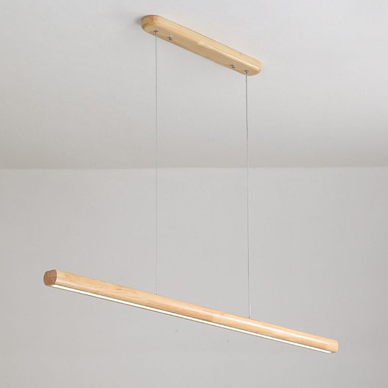 Angled wood-tone pendant showing glowing lower strip