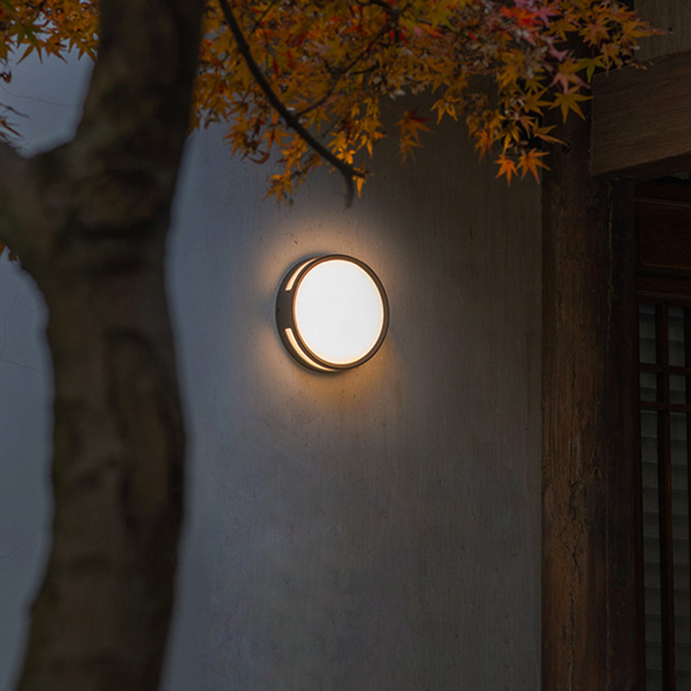 Orr Modern Round Metal/Acrylic Outdoor Waterproof Wall Lamp, Black - Cueteks